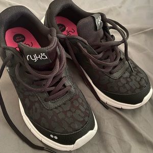 Like new Ryka sneaks size 7W. I got these shoes and find that they run small.